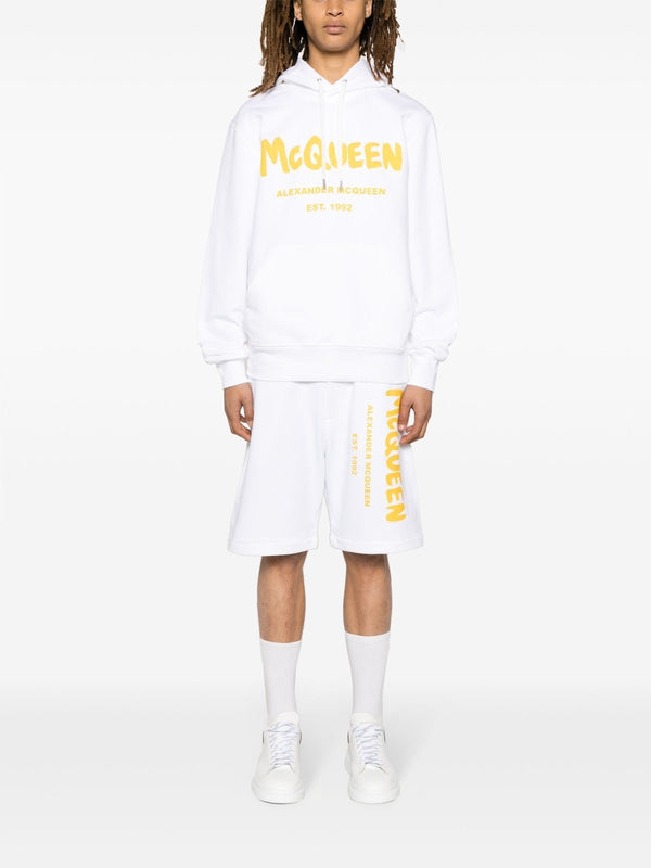 Alexander McQueenGraffiti Logo Print White Shorts at Fashion Clinic