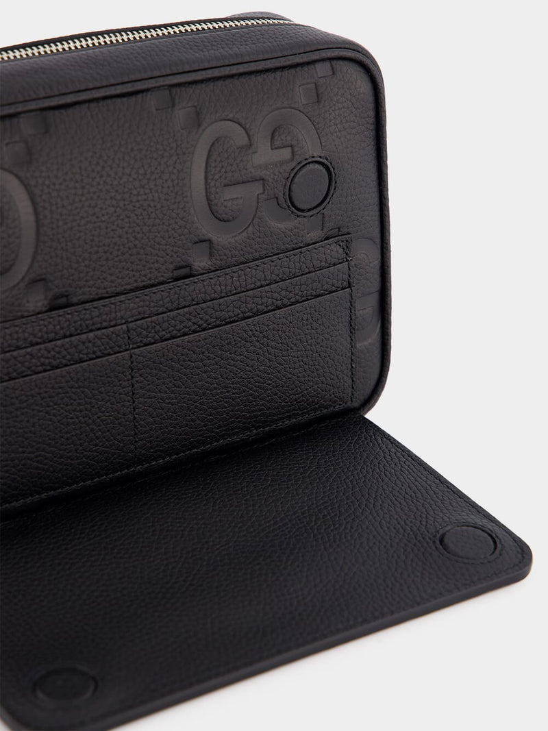 GucciEmbossed Logo Leather Pouch at Fashion Clinic
