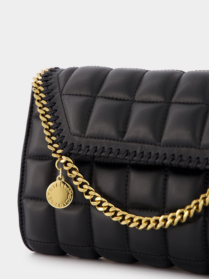 Stella McCartneyLogo Charm Quilted Black Crossbody Bag at Fashion Clinic