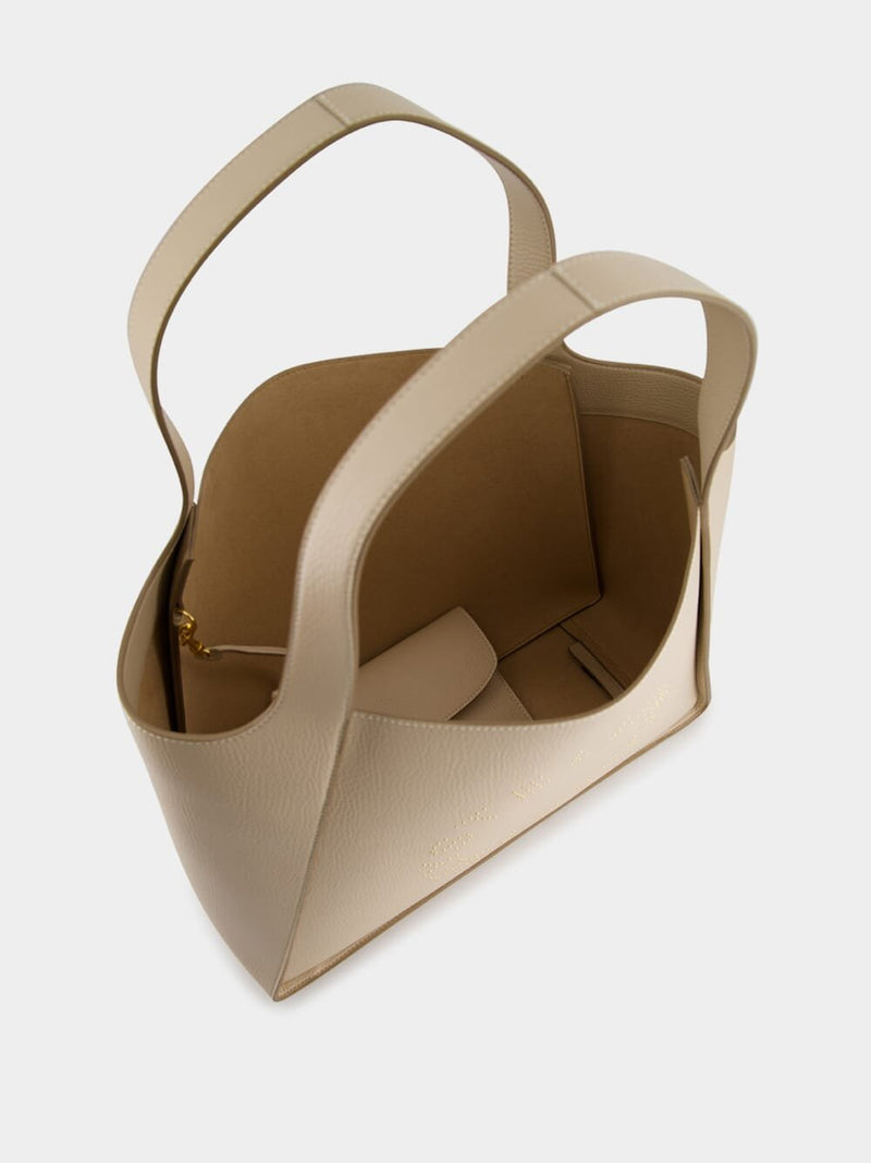 Stella McCartneyLogo Studded Grainy Alter Mat Cream Tote Bag at Fashion Clinic